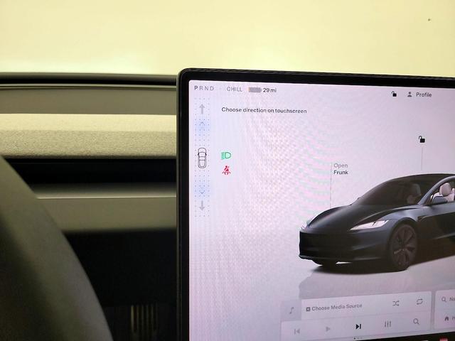 Photo of 2024 Black Tesla Model 3