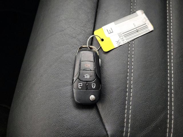 Photo of 2013 Burgundy Ford Fusion Hybrid