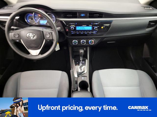Photo of 2014 White Toyota Corolla