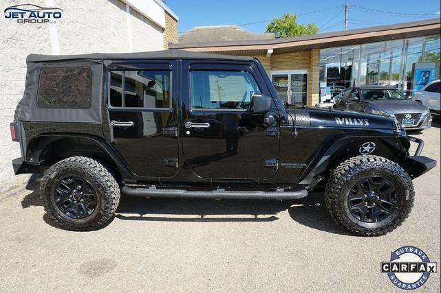 Photo of 2016 Black Clearcoat Jeep Wrangler Unlimited