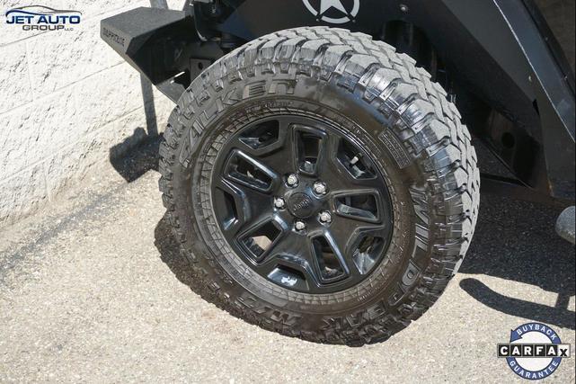 Photo of 2016 Black Clearcoat Jeep Wrangler Unlimited