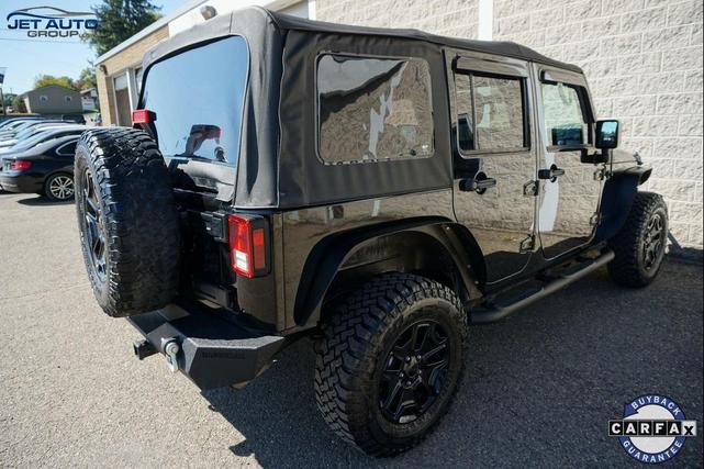 Photo of 2016 Black Clearcoat Jeep Wrangler Unlimited