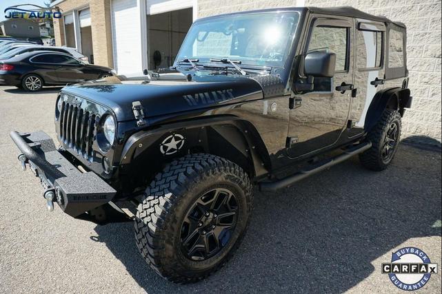 Photo of 2016 Black Clearcoat Jeep Wrangler Unlimited