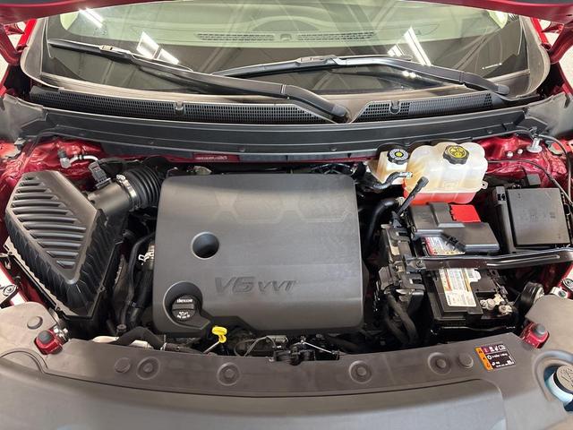 Photo of 2023 Cherry Red Tintcoat Buick Enclave