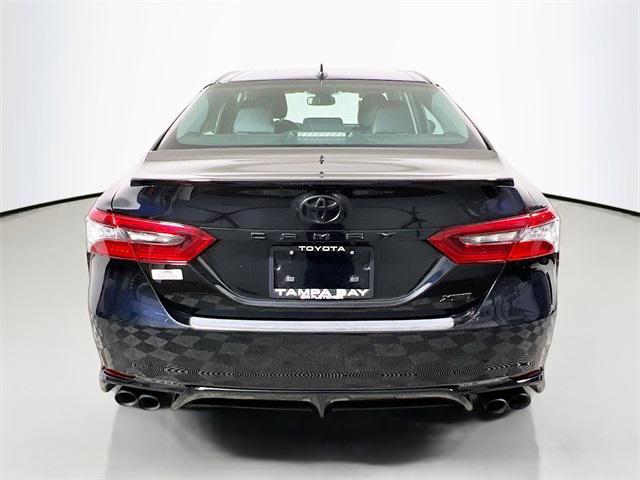 Photo of 2023 Midnight Black Toyota Camry