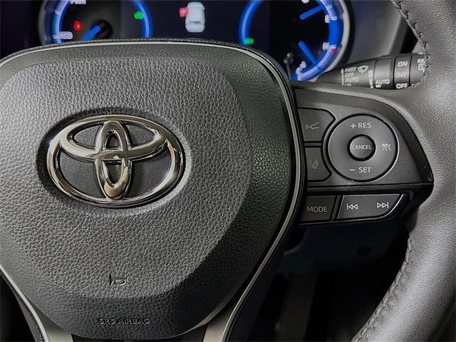 Photo of 2023 Ruby Flare Pearl Toyota RAV4 Hybrid