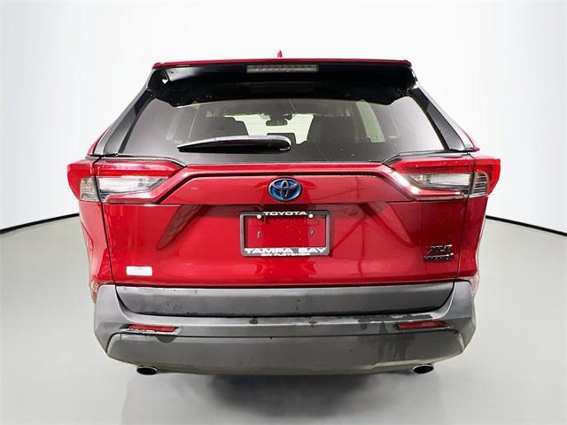 Photo of 2023 Ruby Flare Pearl Toyota RAV4 Hybrid
