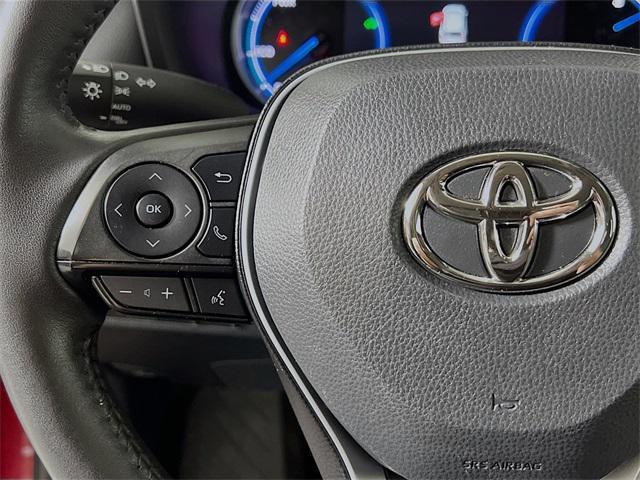 Photo of 2023 Ruby Flare Pearl Toyota RAV4 Hybrid