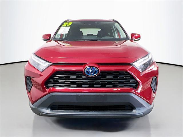Photo of 2023 Ruby Flare Pearl Toyota RAV4 Hybrid