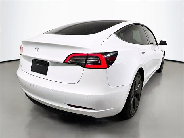 Photo of 2021 Pearl White Multi-Coat Tesla Model 3