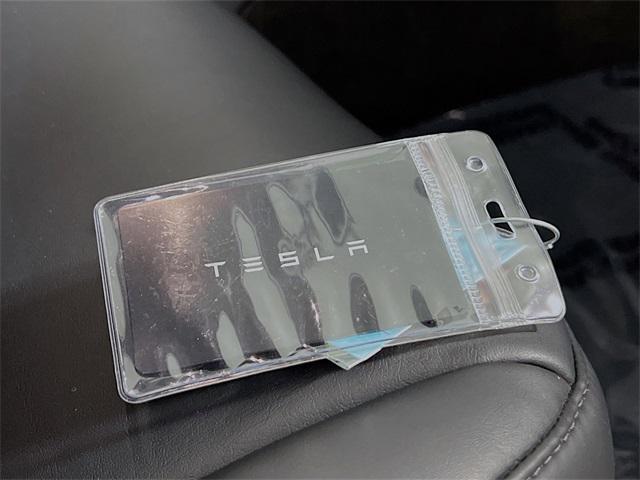 Photo of 2021 Pearl White Multi-Coat Tesla Model 3