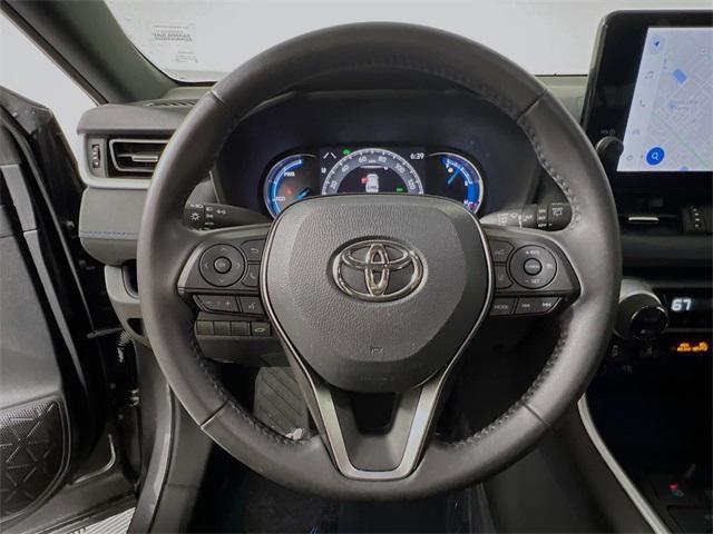 Photo of 2024 Midnight Black Metallic Toyota RAV4 Hybrid