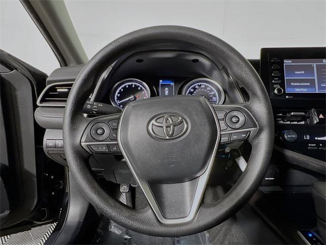 Photo of 2023 Midnight Black Metallic Toyota Camry