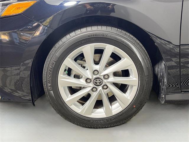 Photo of 2023 Midnight Black Metallic Toyota Camry
