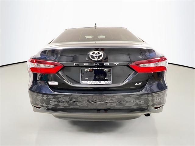 Photo of 2023 Midnight Black Metallic Toyota Camry