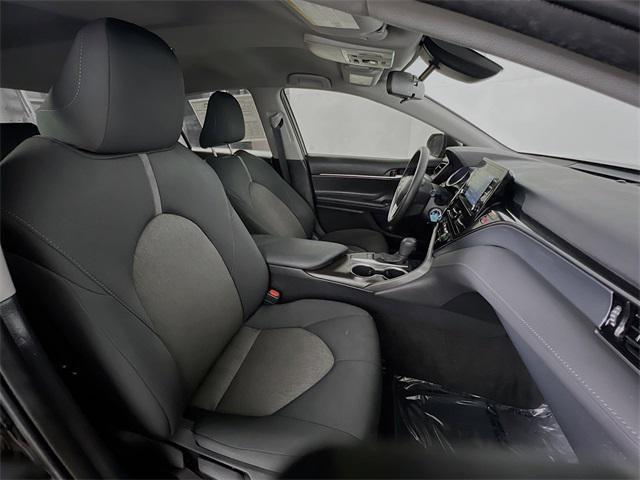 Photo of 2023 Midnight Black Metallic Toyota Camry