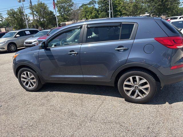 Photo of 2015 Twilight Blue Kia Sportage