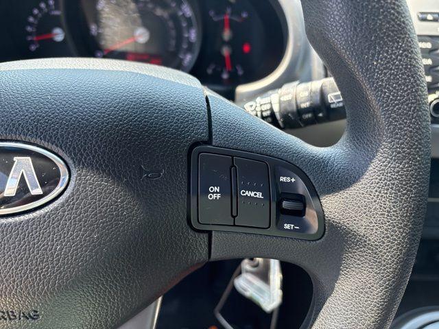 Photo of 2015 Twilight Blue Kia Sportage