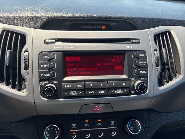 Photo of 2015 Twilight Blue Kia Sportage
