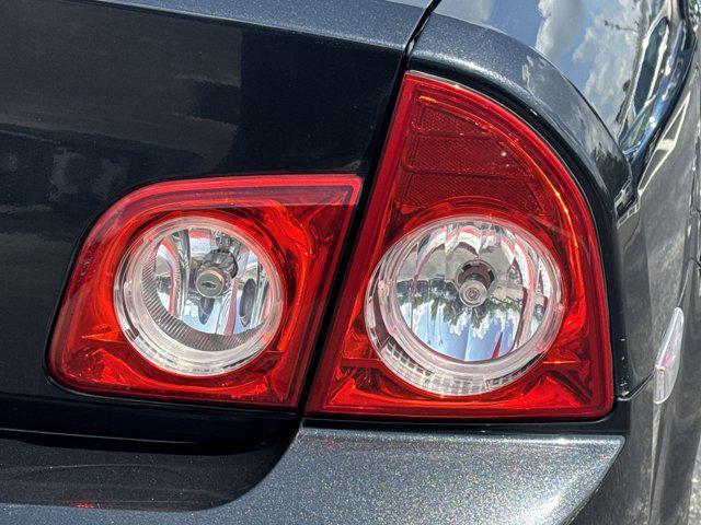 Photo of 2011 Black Granite Metallic Chevrolet Malibu