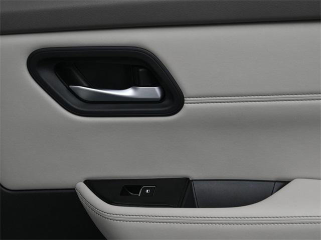 Photo of 2023 Pearl White Tricoat Nissan Rogue