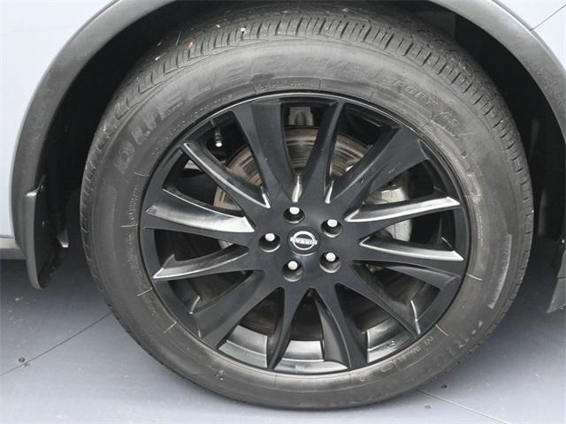 Photo of 2023 Pearl White Tricoat Nissan Rogue