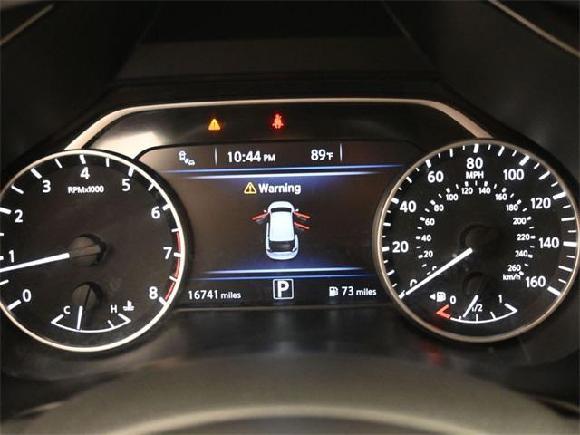 Photo of 2023 Pearl White Tricoat Nissan Rogue