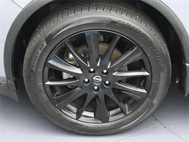 Photo of 2023 Pearl White Tricoat Nissan Rogue