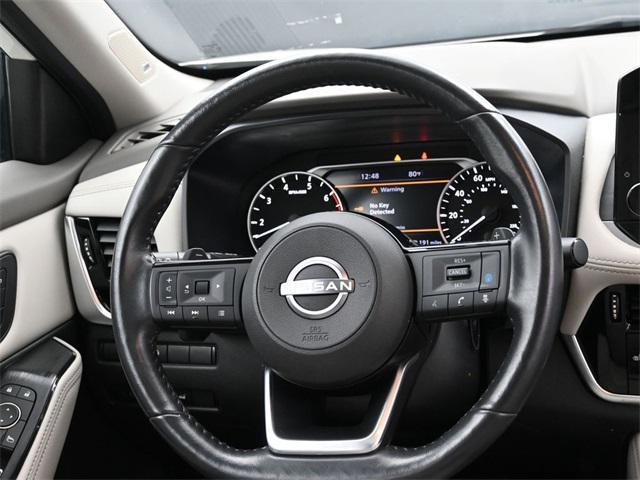 Photo of 2023 Pearl White Tricoat Nissan Rogue