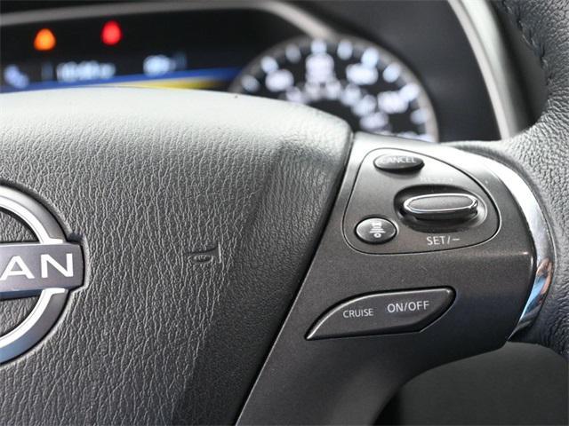 Photo of 2023 Pearl White Tricoat Nissan Rogue
