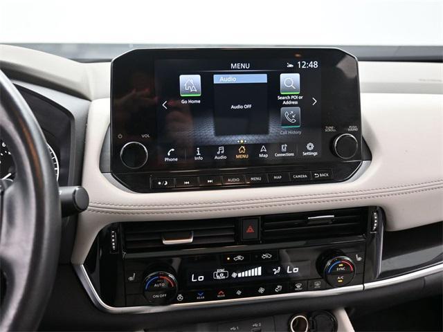 Photo of 2023 Pearl White Tricoat Nissan Rogue