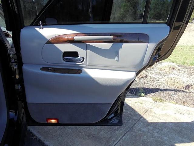 Photo of 2002 Black Clearcoat Lincoln Town Car