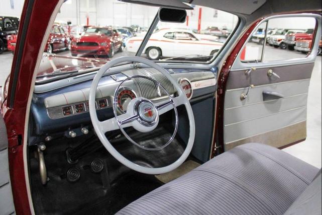 Photo of 1946 Dynamic Maroon Ford Deluxe