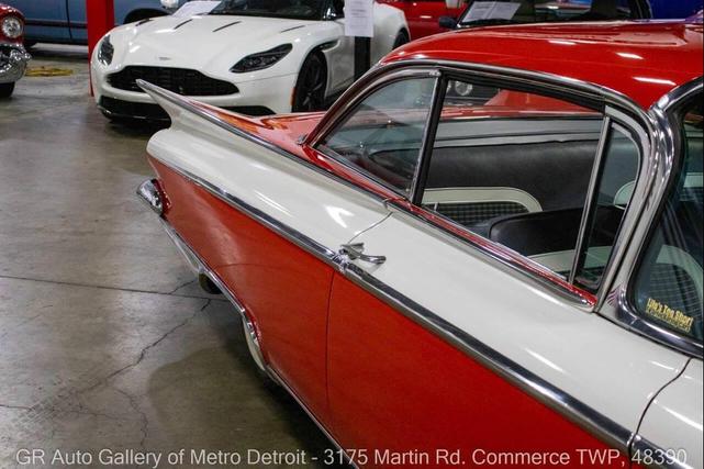 Photo of 1959 Artic White and Tampico Red Buick LeSabre