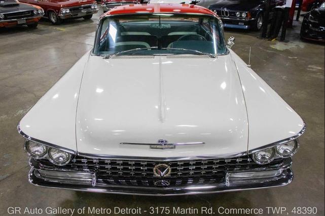 Photo of 1959 Artic White and Tampico Red Buick LeSabre