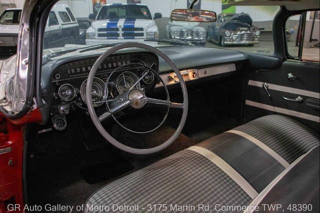 Photo of 1959 Artic White and Tampico Red Buick LeSabre