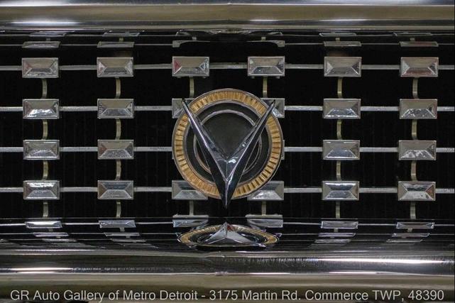 Photo of 1959 Artic White and Tampico Red Buick LeSabre