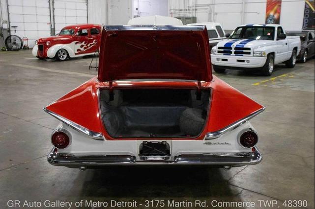 Photo of 1959 Artic White and Tampico Red Buick LeSabre