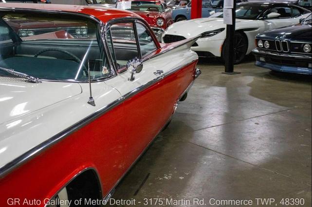 Photo of 1959 Artic White and Tampico Red Buick LeSabre
