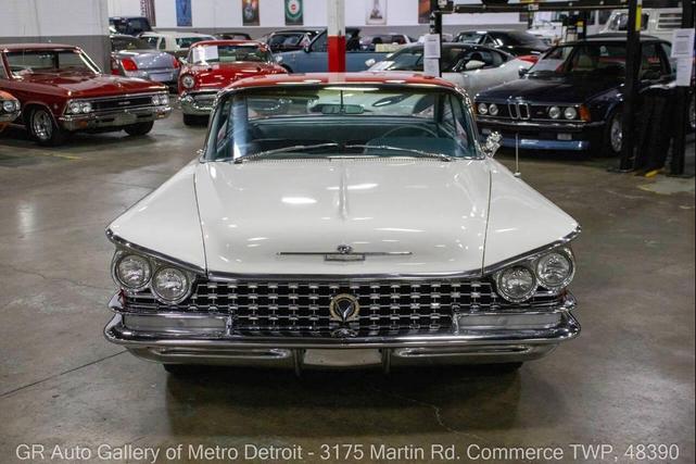 Photo of 1959 Artic White and Tampico Red Buick LeSabre