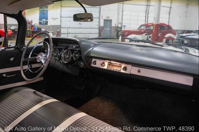 Photo of 1959 Artic White and Tampico Red Buick LeSabre
