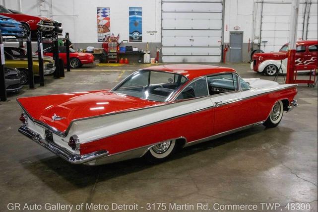 Photo of 1959 Artic White and Tampico Red Buick LeSabre