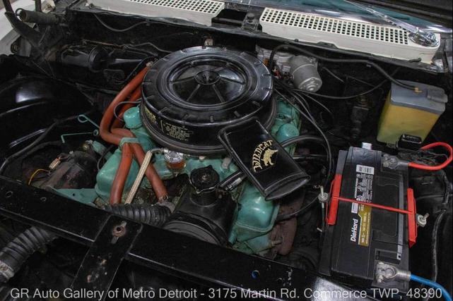 Photo of 1959 Artic White and Tampico Red Buick LeSabre