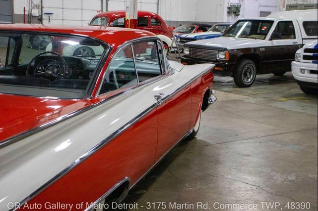 Photo of 1959 Artic White and Tampico Red Buick LeSabre