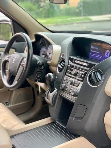 Photo of 2013 Burgundy Honda Pilot