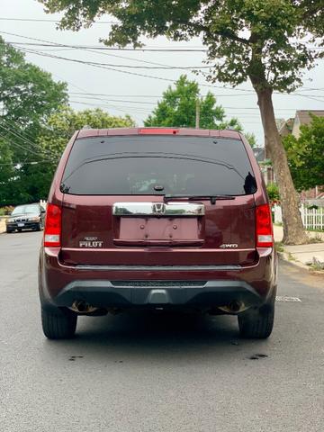 Photo of 2013 Burgundy Honda Pilot