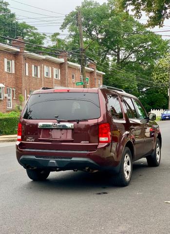 Photo of 2013 Burgundy Honda Pilot