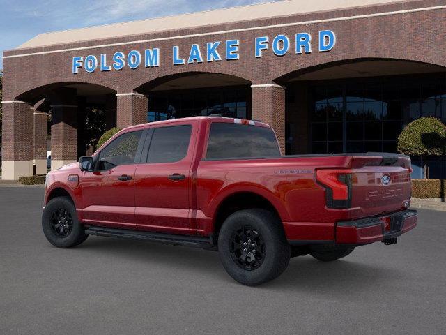 Photo of 2025 Red Metallic Ford F-150 Lightning