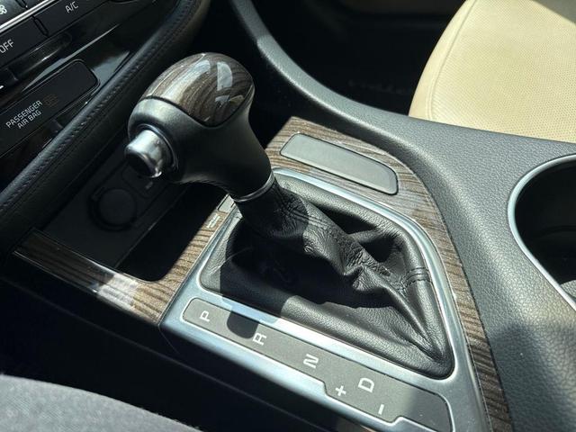 Photo of 2014 Dark Cherry Kia Optima