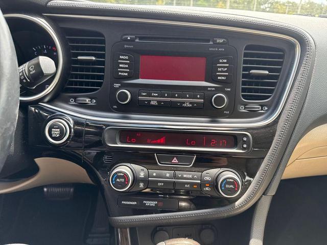 Photo of 2014 Dark Cherry Kia Optima